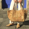A woman with cork tote bag